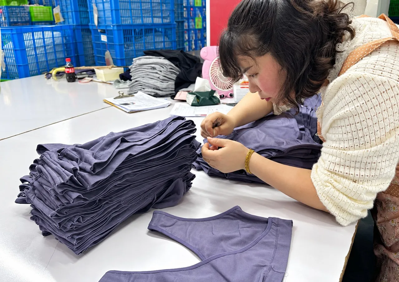 Garment inspection at the Sportxia factory