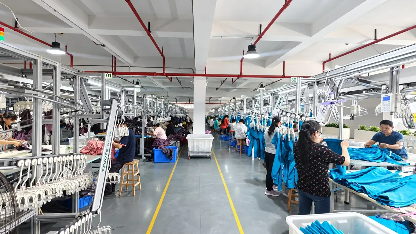 Real garment production workshop from the supplied Sportxia factory photo collection