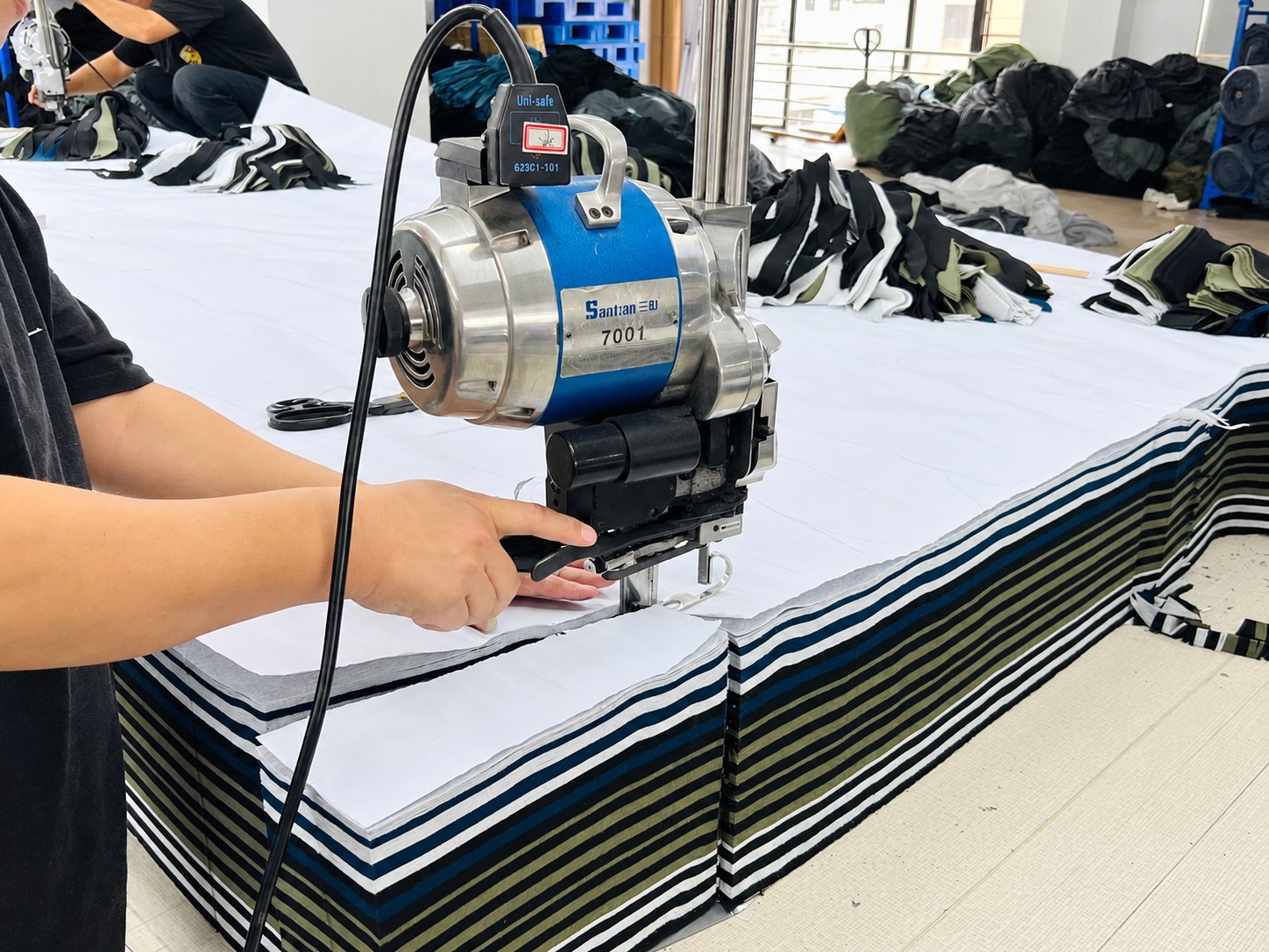 Fabric cutting in the garment workshop